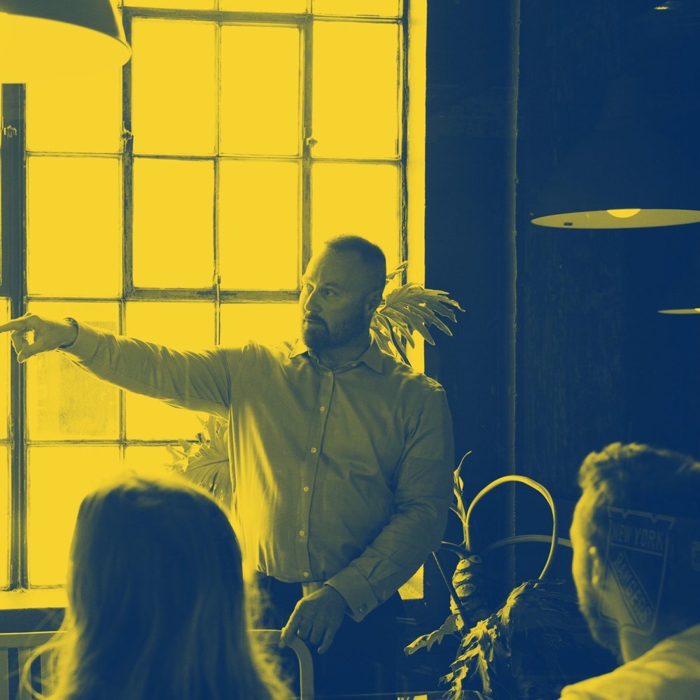 Brad Monaghan presenting to a sales team